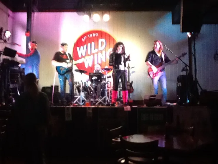 Band performing live at Wild Wing venue